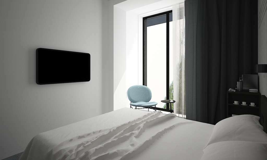 ホテル Golden Tulip Design ティビリシ 部屋 写真