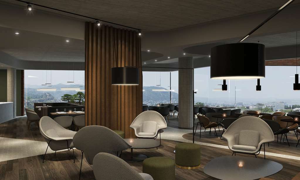 ホテル Golden Tulip Design ティビリシ レストラン 写真